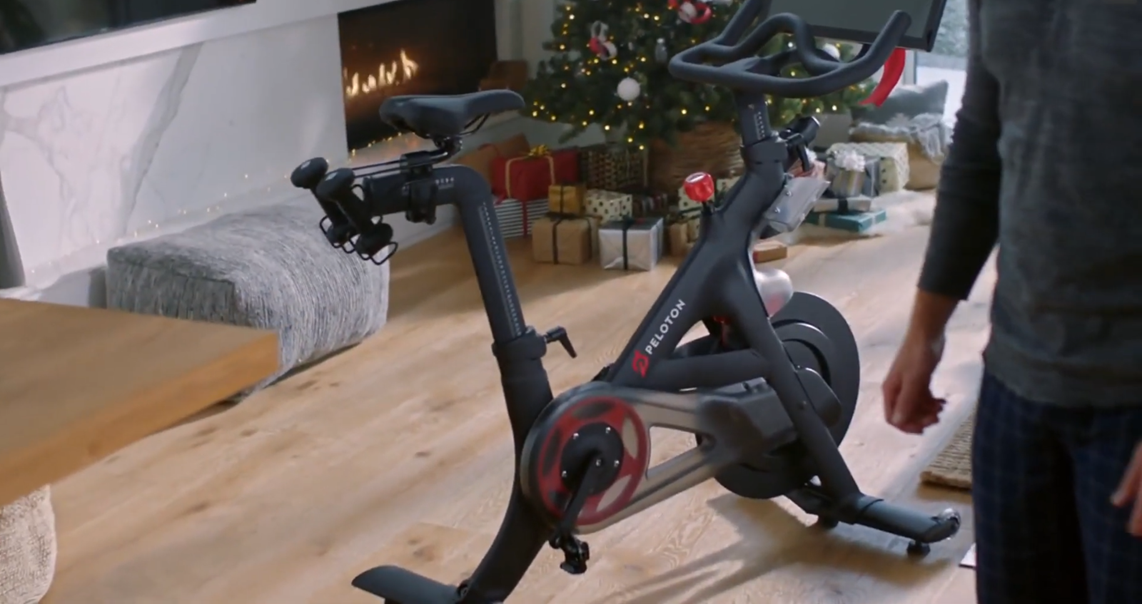 An image from the video wherein the Paleton stationary bike is shown