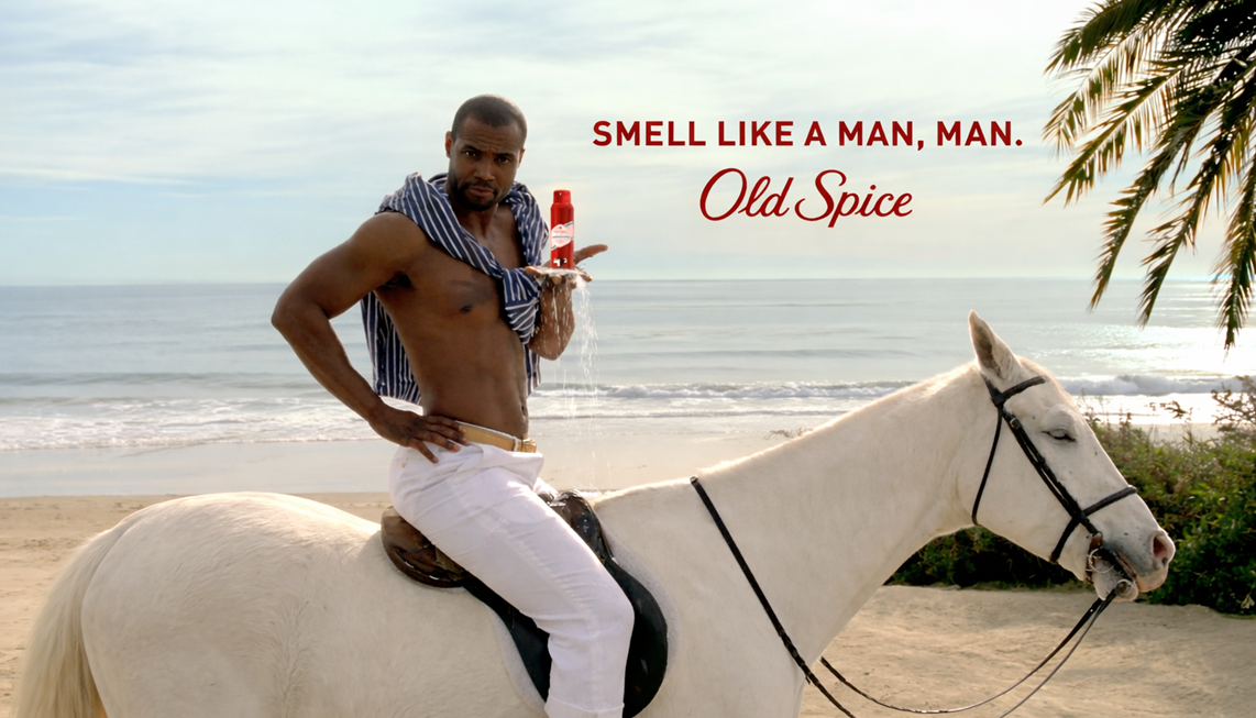 An image from the video wherein Isaiah Mustafa is riding a horse holding Old Spice product
